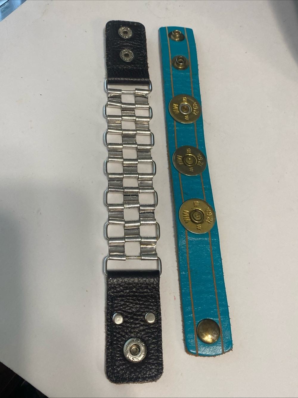 Two Leather Bracelets, Lizzy J's Shotgun Shell & Plunder